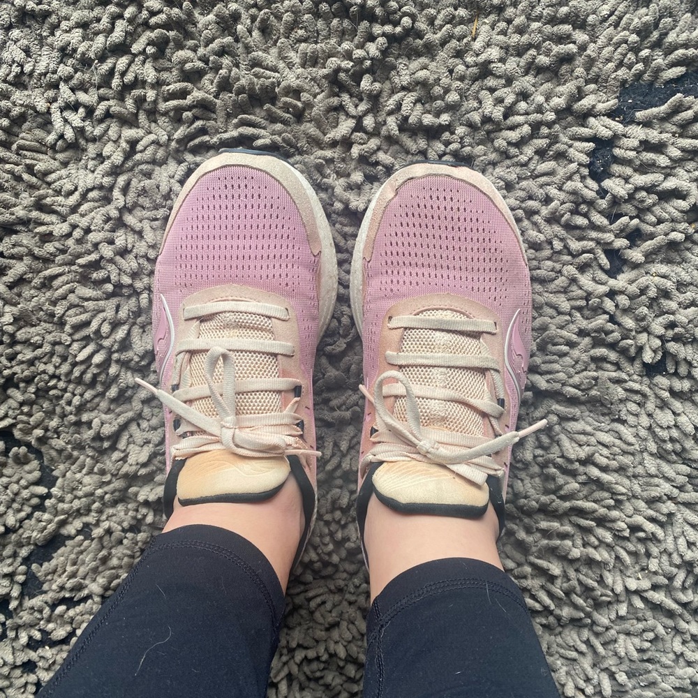 Saucony Freedom sneakers, well-loved, used for jogging